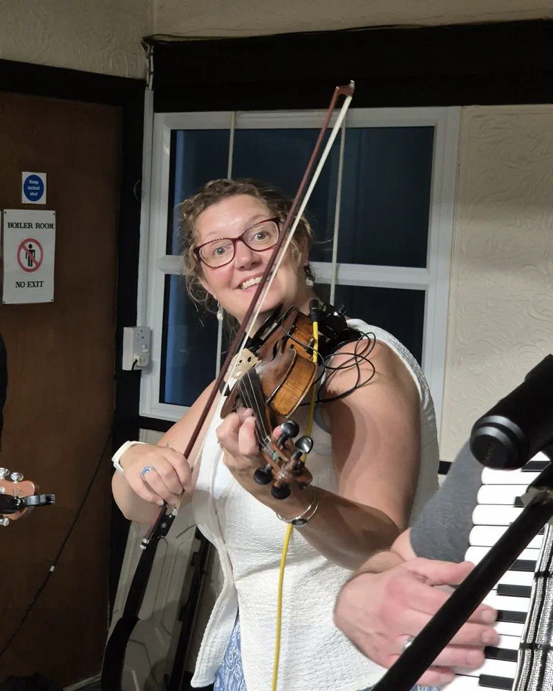 Sarah playing fiddle